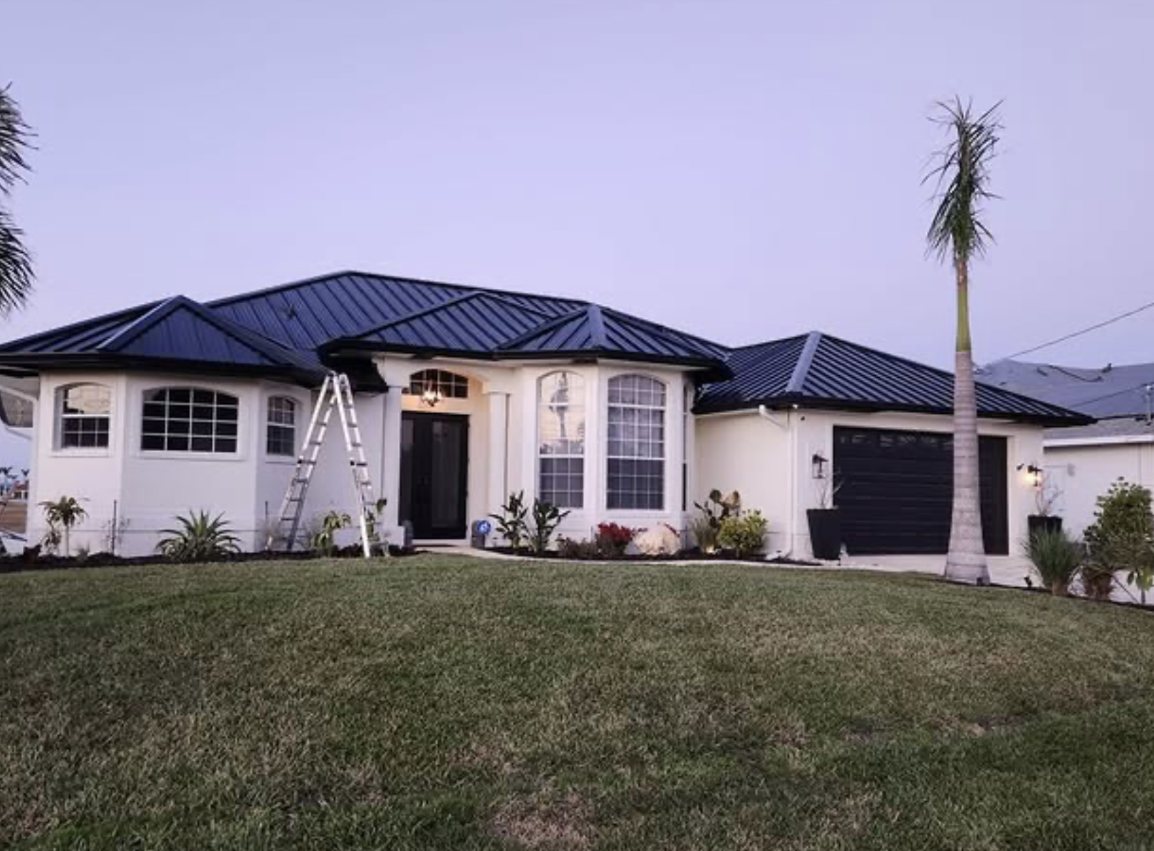 Roofing team on a sunny Fort Myers residential project
